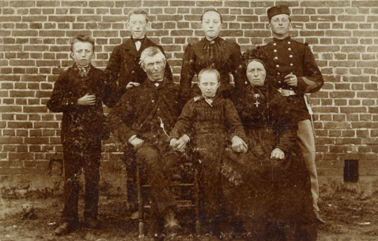 Arnold Voets and Cornelia Giesberts with their children, my grandfather Joannes Henricus  wearing his uniform - 1897